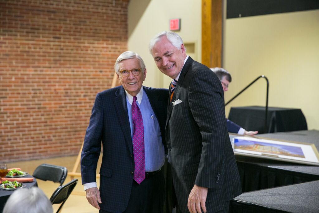 President Underwood standing with Dr. Godsey