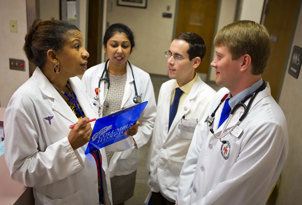 Medical students standing in a hall