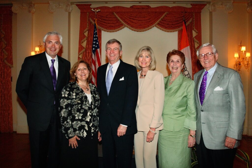 President Underwood standing with a group of individuals