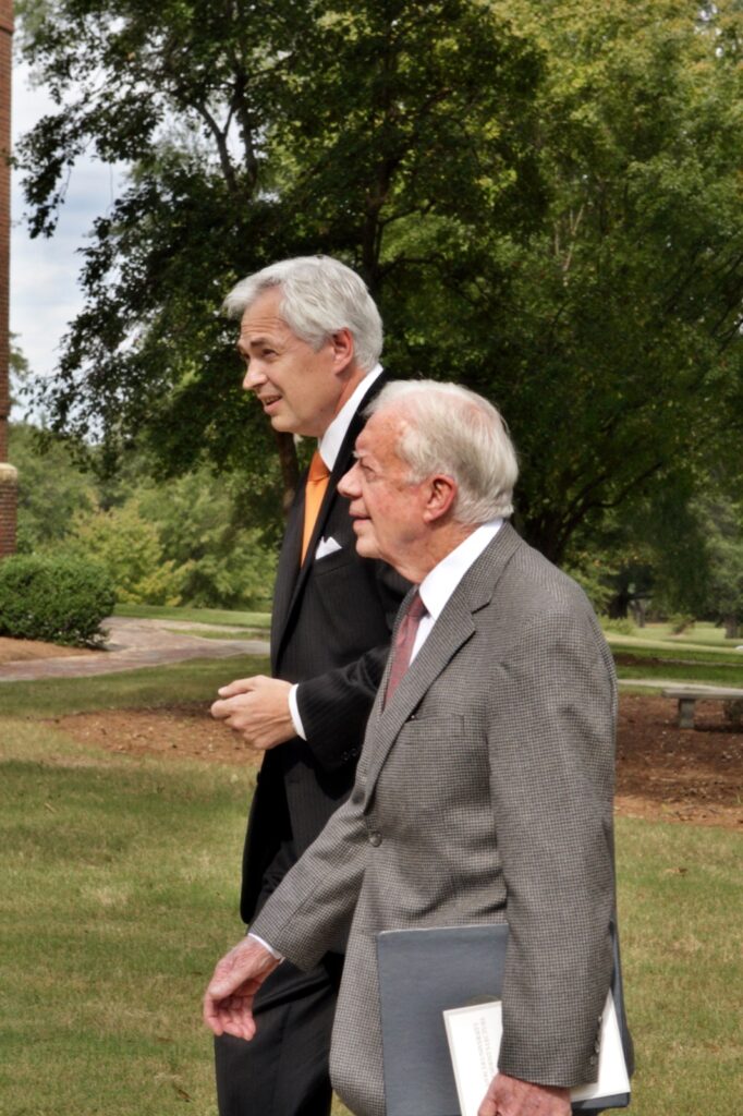 President Underwood walking with Jimmy Carter