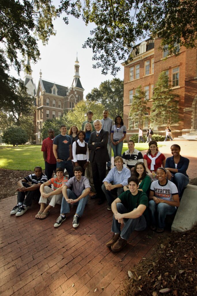 President Underwood standing with a group of students