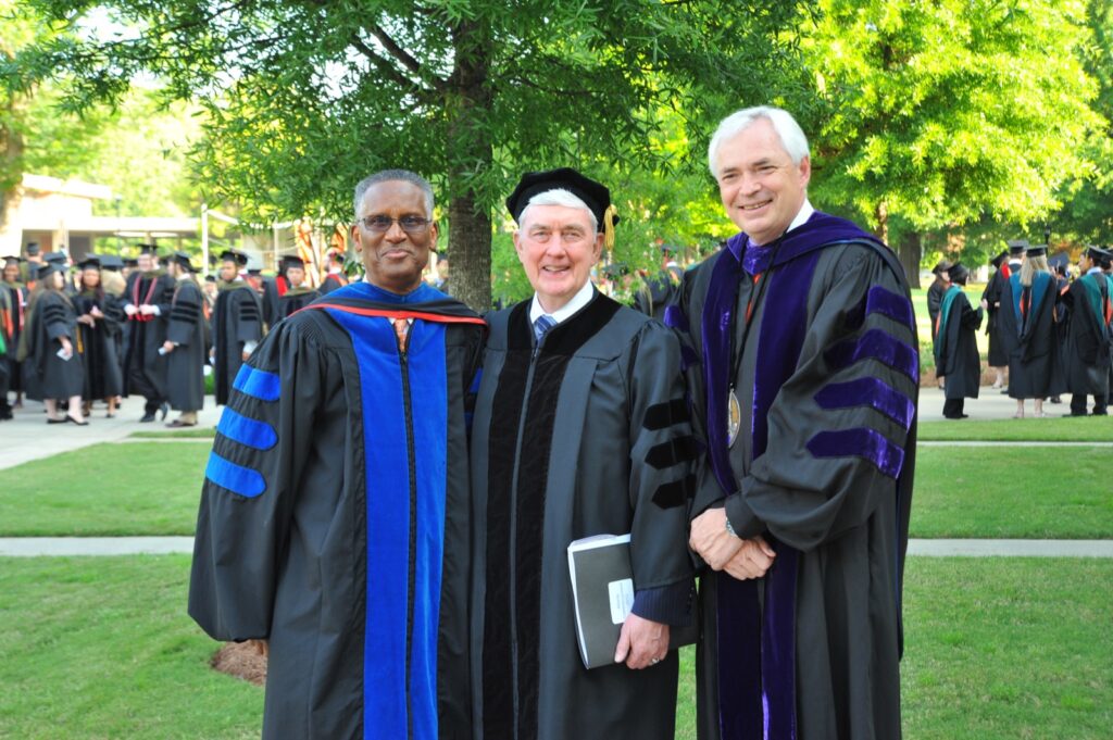 President Underwood standing with faculty members