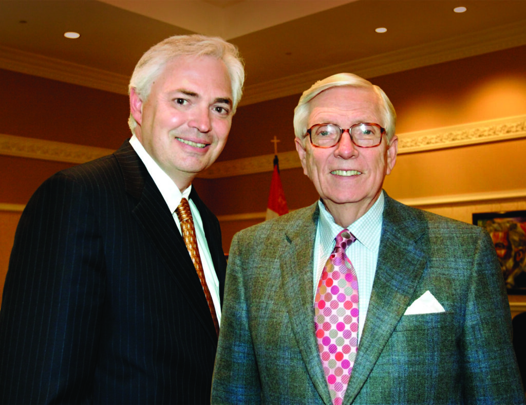 President Underwood standing with Dr. Godsey