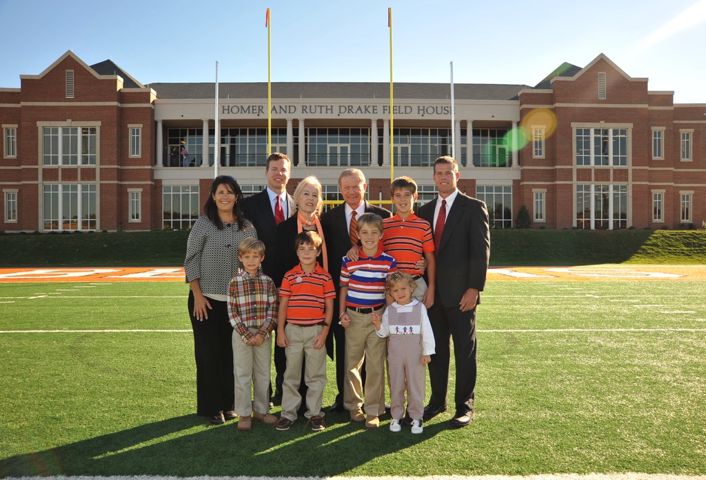 Drake Family in front of Drake Field House