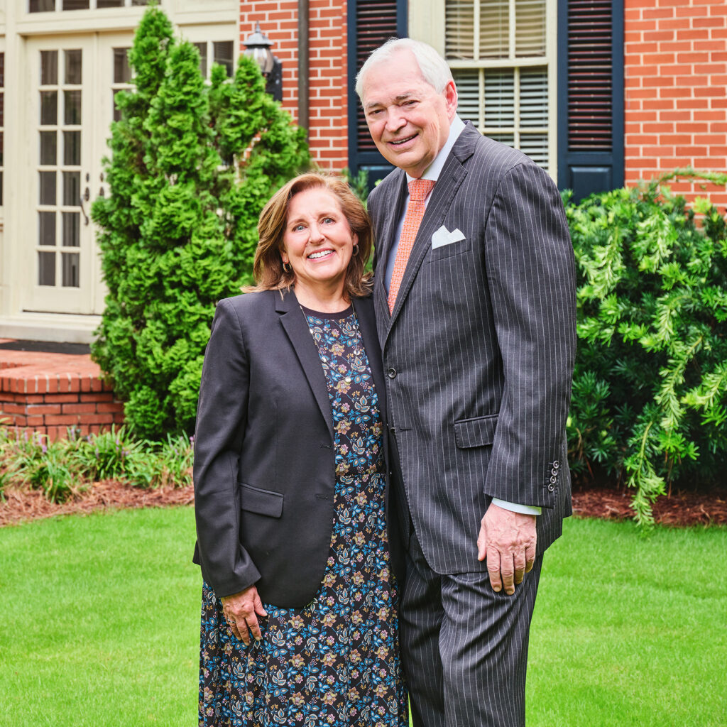 President and Lesli Underwood outside of their home